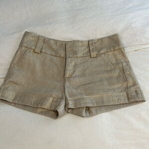 ￼ Alice and Olivia. gold metallic. Size 0. 8 inch rise.